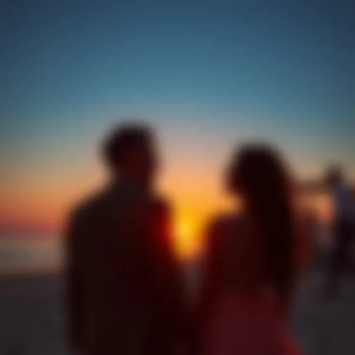 A couple enjoying a sunset at a luxury beach resort