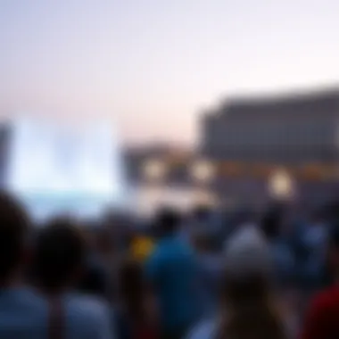 Audience Enjoying the Fountain Show Crowd enjoying the breathtaking Dubai Fountain show
