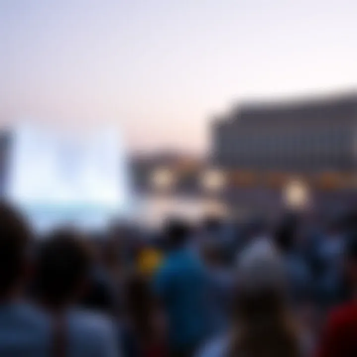 Audience Enjoying the Fountain Show Crowd enjoying the breathtaking Dubai Fountain show