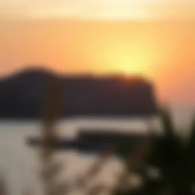 A stunning sunset over Pearl Beach, highlighting the cliffs in the background