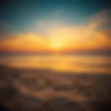 A vibrant sunset casting hues over the sandy shores