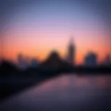 Dubai skyline at dawn with a mosque silhouette